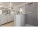 Modern bathroom with double vanity and walk-in shower at 11163 W Elm Ln, Avondale, AZ 85323