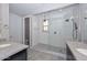 Modern bathroom with large walk-in shower and double vanity at 11618 W Levi Dr, Avondale, AZ 85323