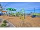 Modern playground with shade structures at 11618 W Levi Dr, Avondale, AZ 85323