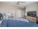 Bedroom with a double bed, TV, and built-in wardrobe at 1255 N Arizona Ave # 1341, Chandler, AZ 85225