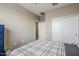 Bedroom with a double bed, closet, and view of another room at 1255 N Arizona Ave # 1341, Chandler, AZ 85225