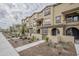 Modern townhome community with landscaped yards and sidewalks at 1255 N Arizona Ave # 1341, Chandler, AZ 85225