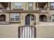 Townhome entrance with gated walkway and small patio at 1255 N Arizona Ave # 1341, Chandler, AZ 85225