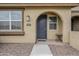 Townhome entryway with gray door and arched entryway at 1255 N Arizona Ave # 1341, Chandler, AZ 85225