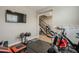 Home gym with exercise equipment and TV at 1255 N Arizona Ave # 1341, Chandler, AZ 85225