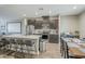 Modern kitchen with stainless steel appliances and an island with seating at 1255 N Arizona Ave # 1341, Chandler, AZ 85225