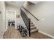 Modern staircase with dark metal railing and carpeted steps at 1255 N Arizona Ave # 1341, Chandler, AZ 85225