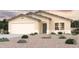 Charming single story home with 2-car garage and desert landscaping at 1415 W Pelayo St, Coolidge, AZ 85128