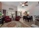 Open concept dining area with a large table and access to the living room at 1577 E Laurel Dr, Casa Grande, AZ 85122