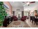 Bright and airy living room with two leather armchairs and a large area rug at 1577 E Laurel Dr, Casa Grande, AZ 85122