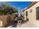 Private patio with table and chairs, perfect for dining al fresco at 1577 E Laurel Dr, Casa Grande, AZ 85122