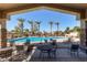 Relaxing pool area with lounge chairs and tables at 1577 E Laurel Dr, Casa Grande, AZ 85122