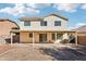 Two-story house with covered patio and backyard at 15857 W Yavapai St, Goodyear, AZ 85338