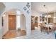 Bright entryway with wood floors and view into dining room at 16615 N 30Th Ave, Phoenix, AZ 85053