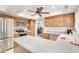 Modern kitchen with stainless steel appliances and an island at 16615 N 30Th Ave, Phoenix, AZ 85053