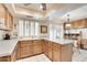 Kitchen with wood cabinets and a breakfast bar at 16615 N 30Th Ave, Phoenix, AZ 85053