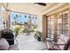 Patio with seating area, grill, and view of lush landscaping at 16615 N 30Th Ave, Phoenix, AZ 85053