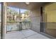 Balcony overlooking the pool and palm trees at 1701 E Colter St # 223, Phoenix, AZ 85016