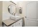 Contemporary bathroom featuring modern sink, neutral walls, subway tile backsplash, and decorative mirror at 1701 E Colter St # 223, Phoenix, AZ 85016