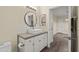 Bright bathroom featuring modern sink, white subway tile backsplash, and wood-look floors at 1701 E Colter St # 223, Phoenix, AZ 85016