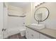 Bathroom featuring a modern vanity and mirror as well as a bathtub with white tile surround at 1701 E Colter St # 223, Phoenix, AZ 85016