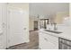 Bright, white kitchen open to living area at 1701 E Colter St # 223, Phoenix, AZ 85016