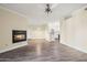 Spacious living room features a fireplace and view to the kitchen at 1701 E Colter St # 223, Phoenix, AZ 85016
