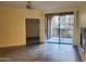 Living room with sliding doors to balcony at 1701 E Colter St # 223, Phoenix, AZ 85016