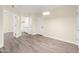 Spacious living area with a neutral color palette and hardwood style floors at 1701 E Colter St # 223, Phoenix, AZ 85016
