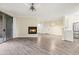 Spacious living room with fireplace and patio access at 1701 E Colter St # 223, Phoenix, AZ 85016