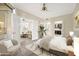 Bright main bedroom offers ample natural light, an ensuite bathroom, walk-in closet, and open layout at 1701 E Colter St # 223, Phoenix, AZ 85016