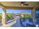 Relaxing backyard patio with hot tub and seating area at 18216 W Foothill Dr, Surprise, AZ 85387