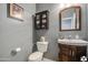 Clean bathroom with updated vanity and fixtures at 18216 W Foothill Dr, Surprise, AZ 85387