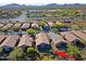 Aerial view of home showcasing backyard and community at 1828 W Owens Way, Anthem, AZ 85086