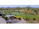 Aerial view of golf course with ponds, landscaping, and golf carts at 1828 W Owens Way, Anthem, AZ 85086