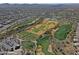 Aerial view of a golf course and surrounding community at 1828 W Owens Way, Anthem, AZ 85086