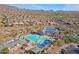 Aerial view of community pool and tennis courts at 1828 W Owens Way, Anthem, AZ 85086