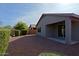 Desert landscaping with a covered patio and shrubs at 1828 W Owens Way, Anthem, AZ 85086