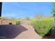 Landscaped backyard with gravel and desert plants at 1828 W Owens Way, Anthem, AZ 85086