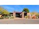 Attractive community building exterior with landscaping and a covered entrance at 1828 W Owens Way, Anthem, AZ 85086