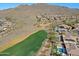 Golf course view with mountain backdrop at 1828 W Owens Way, Anthem, AZ 85086