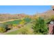 Scenic view of a lush golf course and desert landscape at 1828 W Owens Way, Anthem, AZ 85086