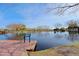 Tranquil community lake with informational signage at 1828 W Owens Way, Anthem, AZ 85086