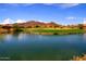 Peaceful lakefront property with mountain views at 1828 W Owens Way, Anthem, AZ 85086