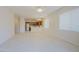 Open living room with tile floors and ceiling fan at 1828 W Owens Way, Anthem, AZ 85086