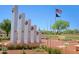 Veterans memorial with flagpole and landscaping at 1828 W Owens Way, Anthem, AZ 85086