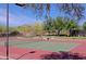 Well-maintained tennis court with mountain backdrop at 1828 W Owens Way, Anthem, AZ 85086