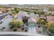 One-story house, landscaped yard, and neighborhood view at 18311 W East Wind Ave, Goodyear, AZ 85338