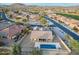 House with pool and backyard, golf course view at 18311 W East Wind Ave, Goodyear, AZ 85338