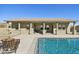 Relaxing backyard oasis with covered patio and pool at 18311 W East Wind Ave, Goodyear, AZ 85338